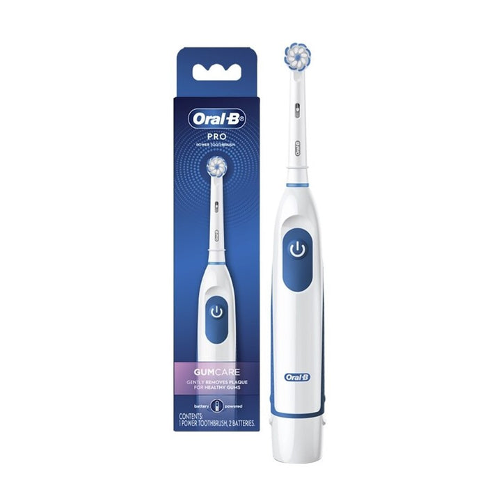 Oral-B electric toothbrush with packaging on a white background